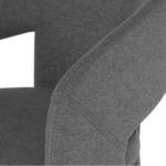 Close-up of shale grey chair fabric texture and double stitching detail on curved armrest