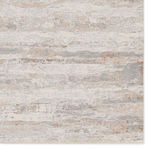 Close-up showing abstract pattern details with layered shades of cream, tan, and rust