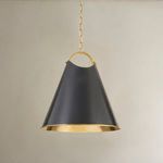 Pendant light angled slightly differently in room context with soft lighting on wall background