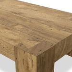 Close-up of table top surface showing detailed wood grain and rustic wormwood oak texture with joinery