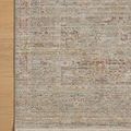 Corner close-up of Ida Spa Sunrise rug on light wood floor highlighting soft colors and delicate pattern