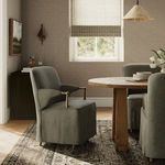 Brently Dining Chair angled side view highlighting armrest and slightly curved backrest