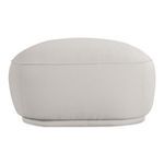 Marion Ottoman rear view showing full curve of fabric upholstery and gathered details