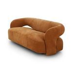 Side profile showing solid rounded armrest with visible stitching in rich cognac tone