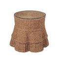 Round end table with hand-woven seagrass draped over metal frame and glass tabletop, natural tan color