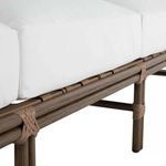 Side angle close-up showcasing sofa seat cushion and wooden frame details with woven binders