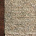 Hand-woven Priya Olive / Graphite Rug with tonal olive and graphite hues, textured weave, and fringed edge