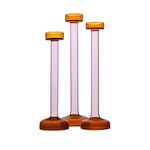 Set of three glass candle holders varying in height, same amber base and top with pink stems