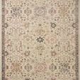 Ivory and multi-color Giada rug with traditional floral and geometric motifs in a muted vintage style