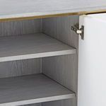 Interior view of cabinet open door revealing two adjustable gray wood shelves
