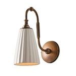 Wilma Sconce side view showing curved swan neck brass arm and top of ceramic shade