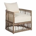 Close-up of chair armrest with tightly wrapped wicker weaving and fabric edge