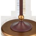 Close-up of the lamp's round antique brass base and textured fluted rust-colored faux leather stem wrapping
