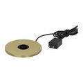 Circular brass charging dock with power cord isolated on white background