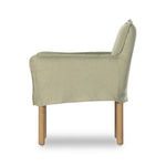 Side profile of chair showing straight slipcover fit from backrest to front edge