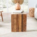 Side view focusing on wooden bench and natural ivory rug showing textured weave and soft tones