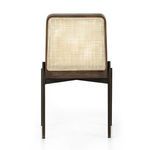Rear view showing the natural cane panel framed by rich oak wood