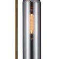Close-up of brushed brass vertical pole and smoked glass shade with glowing bulb