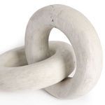 Close-up of reclaimed wood knot showing natural cracks and subtle grain texture in creamy white finish