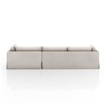 Back view of Habitat sectional showing clean slipcover skirt and straight edges