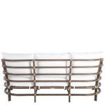 Side view of high back oak sofa with white cushions displaying the armrest curvature