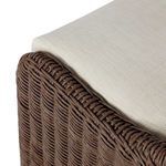 Close-up showing cushion fabric stretched smoothly over the seat frame corner