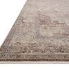 Side perspective emphasizing the rug’s slim fringe edging and color variation along the border