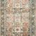 Vertical runner version of Wynter Auburn Multi Rug showcasing same auburn floral medallion design and teal border