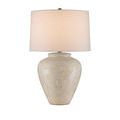 Table lamp with cream and ivory glazed ceramic base and white drum shade on plain background