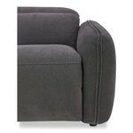 Close-up showing the sofa arm and edge of the seat cushion with textured charcoal gray fabric