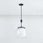 Clementon Pendant with clear glass exterior and fluted opal shiny glass interior, finished in aged brass