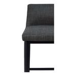 Close-up detail of charcoal-grey upholstery texture and black leg corner of Baron Stool