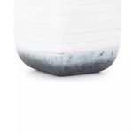 Bottom corner of the grey ombre planter showing rounded edges and color gradient