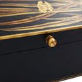 Close-up detail of flower and grass pattern showing fine gold brushstrokes with crackled paint texture