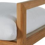 Loveseat frame without cushions from side angle showing open seating area