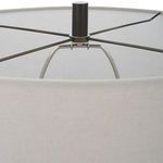 Interior view looking down into lamp shade showing dark bronze finial and metal support frame