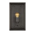 Royster Outdoor Wall Sconce front view with lit bulb inside black brass fixture