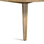 Close-up of single tapered leg with visible natural wood grain