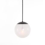 Sutton Pendant with Edison bulb softly lit inside frosted glass globe