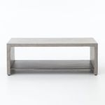 Straight-on view of the coffee table on white background emphasizing its sharp rectangular lines