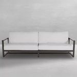 Avondale Sofa front view with dark frame and pale cushions against neutral background