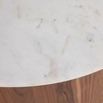 Close-up showing marble surface with light veining and polished texture