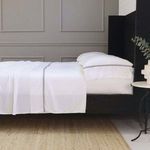 Langston Bamboo Sateen Pillowcase Set Of 2 in ocean blue, soft breathable fabric on king-sized pillows with smooth, subtle...