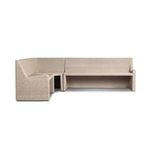 Partial side angle showing banquette seating area with tufted cushion