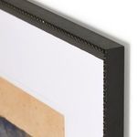 Close-up corner view highlighting decorative edge and wood texture of the black distressed frame