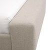 Close-up of headboard near pillows showing tight fabric weave and upholstery