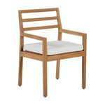 Three-quarter front angle with white cushion showing clean wood grain and arm supports