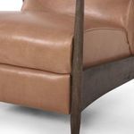 Detail view showing smooth leather upholstery over footrest and surrounding frame