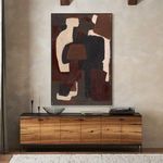 Repetition of painting above sideboard with shadows showing texture and warm ambiance in room
