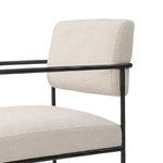 Close-up of fabric texture and pinched stitching on rounded backrest of Fenn Dining Chair